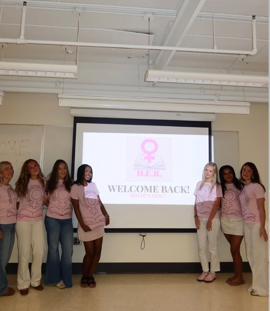 Handmade Join H.E.R. and Girls Rock signs