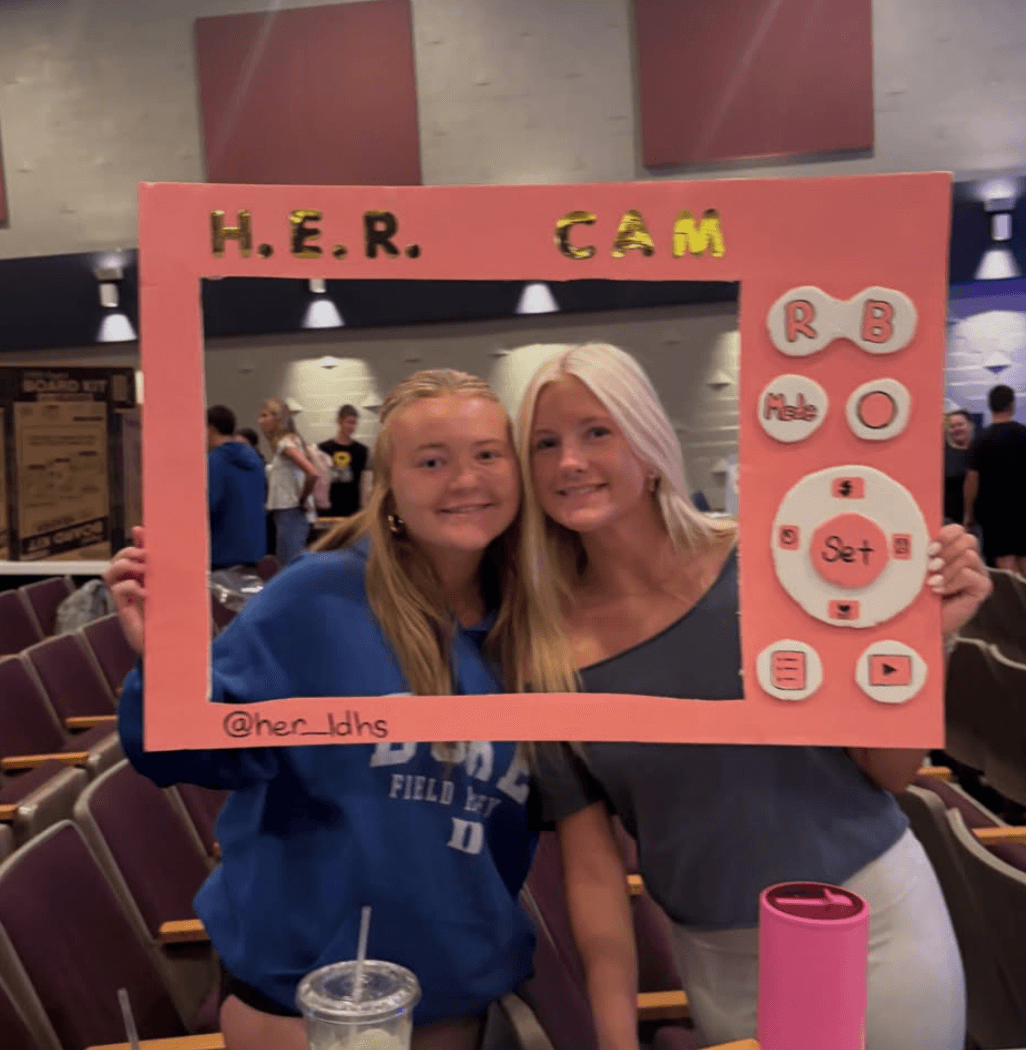 HER chapter students with H.E.R. CAM frame