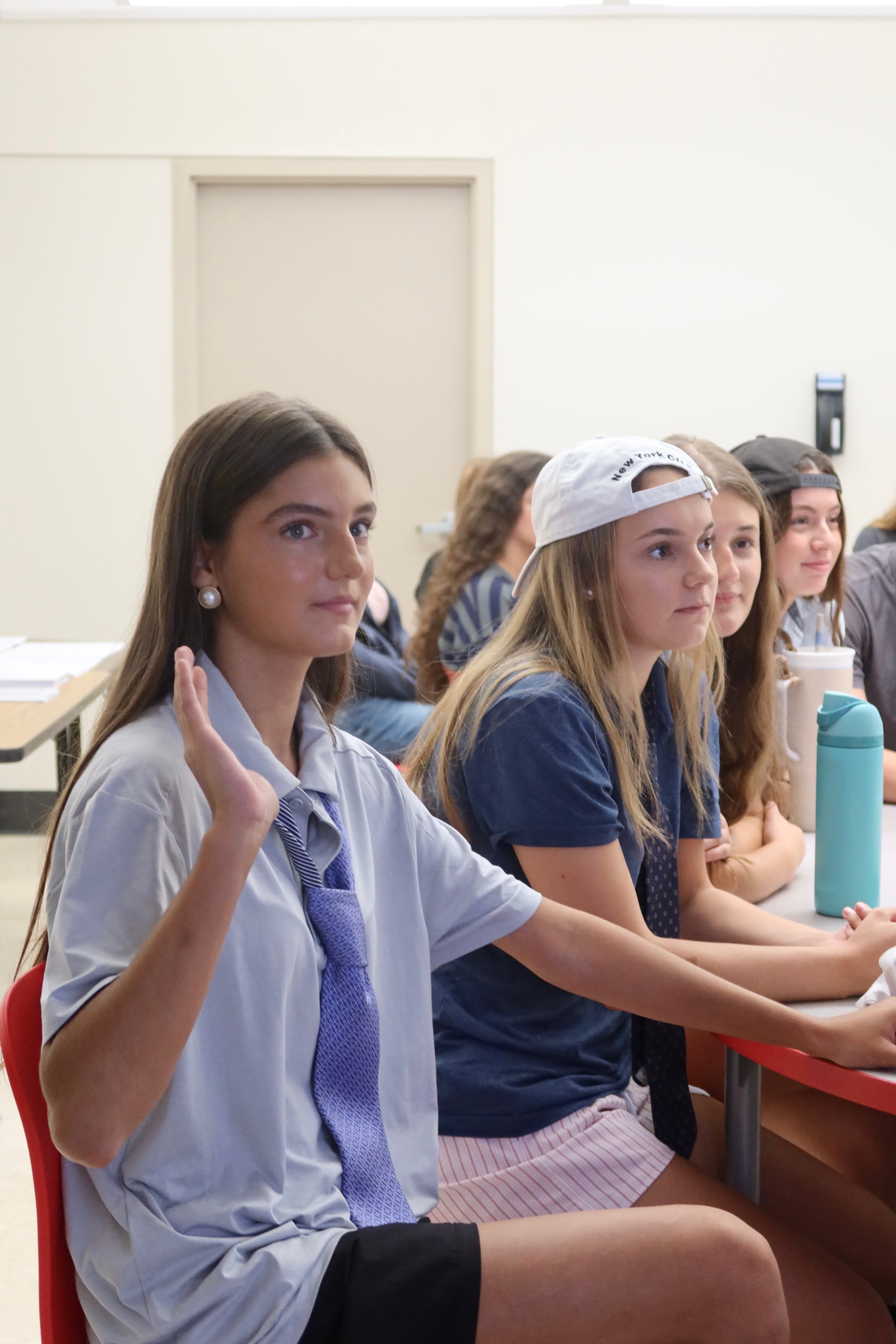 HER students engaged in a classroom discussion